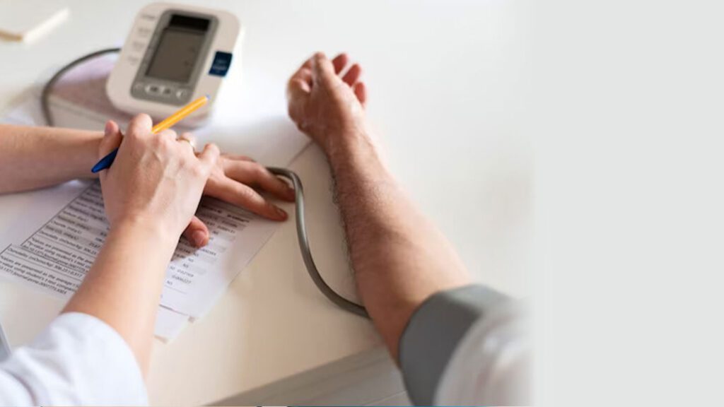 A clinician records blood pressure readings, a critical service offered at high blood pressure service in illinois urgent care, for maintaining patient heart health.