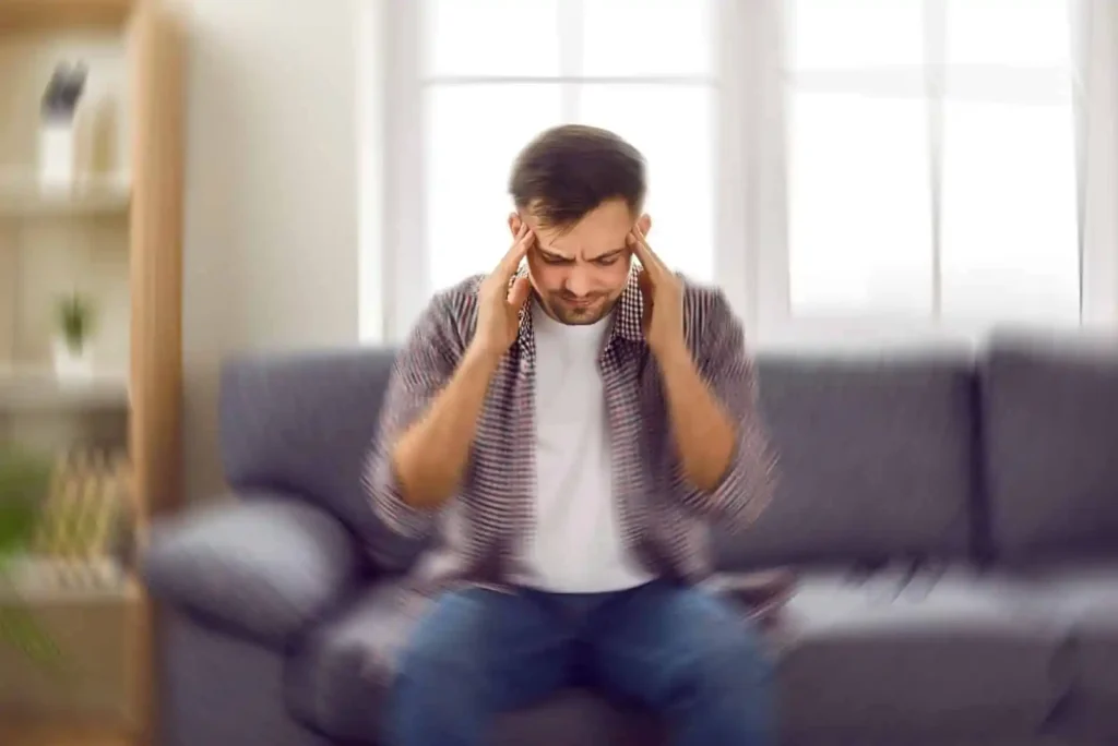 Person experiencing congestion and dizziness