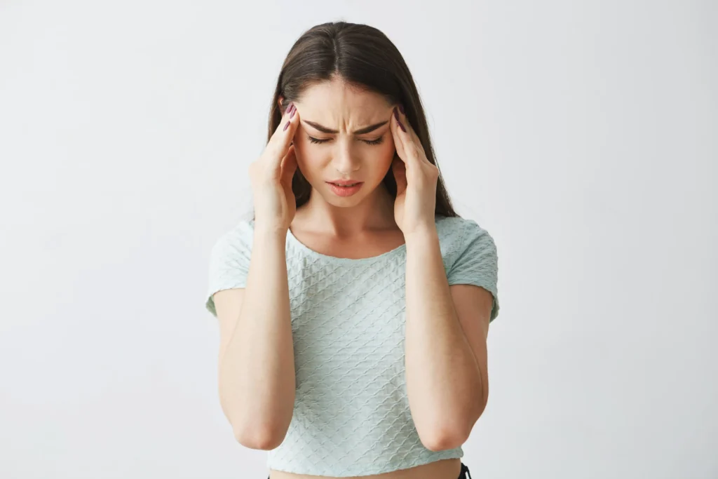 Patient with earache and headache caused by ear infection